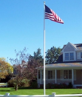 Custom Flag Company Flagpole in Yard